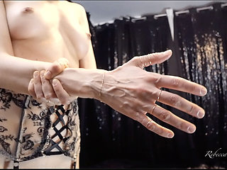 Rebecca Diamante Shows Her Hands' Veins in Topless