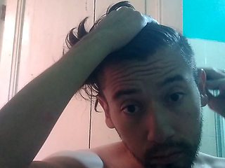 Here trimming my beard and my hair