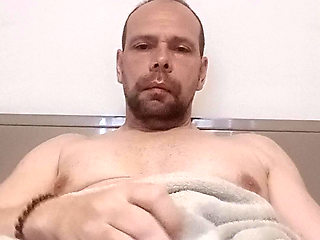 I hide my big erection under the blanket