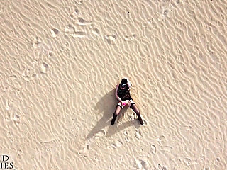 This MILF Masturbates Her Pussy in a Huge, Secluded Desert Landscape While a Drone Watches Her Closely