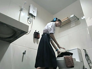 Change into a school uniform in the restroom