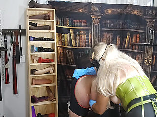 MISTRESS BLONDIE PREPARING HIS ASS FOR A HUGE BBC