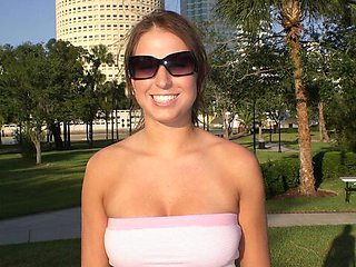 Shameless chick shows off her nice big boobs outdoors