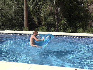 Naked Inflatable Ride and Humping in Outdoor Swimming Pool