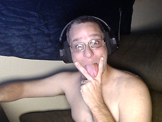 DubeSnackes sitting at his computer watching some porn on the computer. so come watch him play with his fat juicy cock.