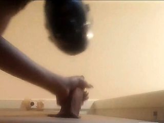 High-Heeled Milf Sucks and Fucks in a Catsuit at a Gloryhole