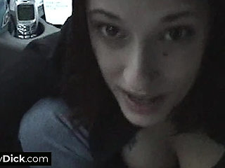 A busty brunette sucking his small dick off in the car