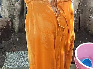 Anita yadav bathing outside with hot boobs