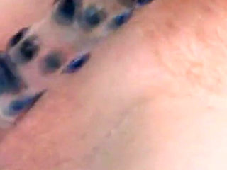 Curly-haired Babe Masturbates with Bottle in Hot Tub