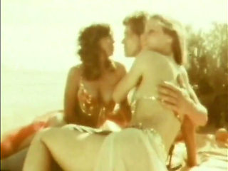 Hot Threesome on the Beach From the American Vintage Porn of the Seventies