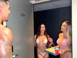 Two horny ladies invite a delivery guy to their bed