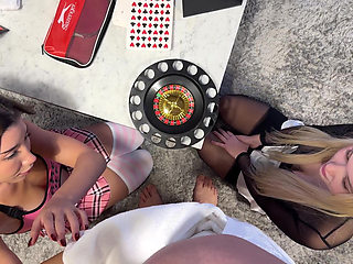 Two girls one guy handjob challenge party for Christmas with presents and roulette spinning