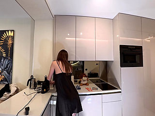 Hot sexy long legs brunette wife in black and red fishnet stockings with a satin nightie teases in the kitchen