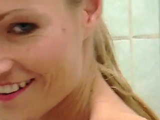 Horny Brunette Sucks Cock in Bathroom and Gets Facial