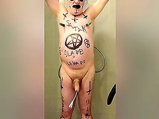 Satan slave takes a perverted piss enema session part 4