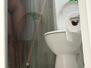 Brunette Gets Caught Masturbating in the Shower