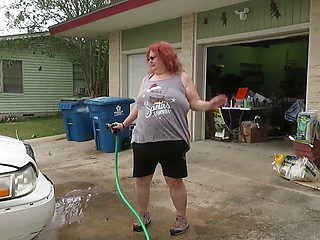 Sexy Mature bbw redhead  Nurse Vicki washes her car!