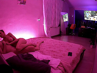 Kamila and Danildo cuddling in bed