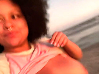 Sunset the Beach and Me with No Bra Showing off My Boobies