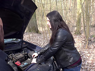 She sucks his cock and he helps her about the car