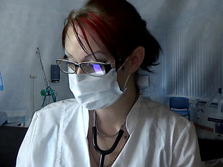 Doctor eating in medical mask and gloves