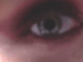 A Girl Is Messing with a Macro Camera