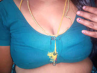 Tamil aunty squeezing her breasts when she is alone and unable to control her emotions.