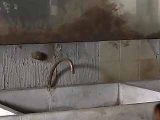 Riding his cock in a public restroom