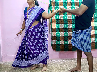 Stepmother and stepson have sex while standing