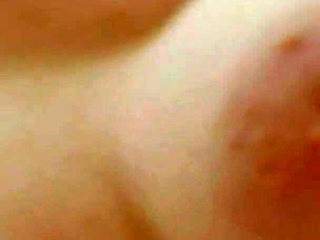 Horny Brunette Masturbates with Kitchen Faucet