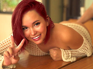 A Voluptuous Asian Woman with Red Hair and a Tight Pussy, a 10 Out of 10 Beauty.