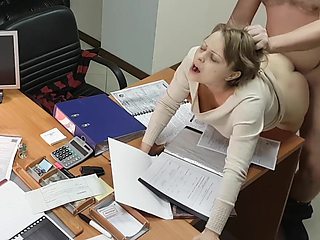 Hot office secretary sucks and rides her boss on the desk