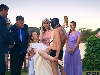 Andrea and her masked groom fucked outdoors on their wedding day