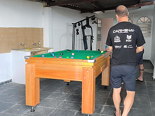 playing billiards for ass