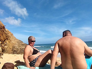 We were almost caught on the beach for the second time while I masturbate her