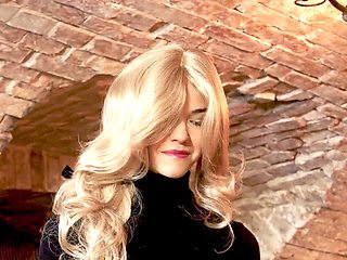 Blonde dominatrix delivers wrecking punches to her helpless victim