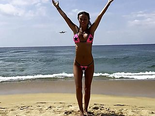 Monika Fox Poses In Pink Bikini With Stars On Beach