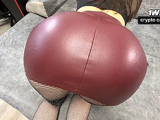 A huge ass in a red leather skirt was stretched over a guy's dick!