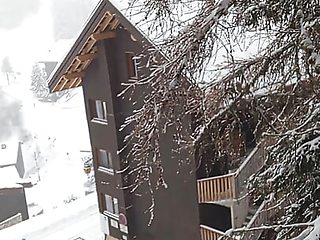 On the Balcony with Snow