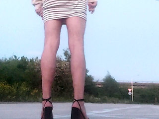 Crossdresser outdide in moorning parking
