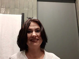 The lady washed in the shower and sat