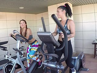 Amateur bitches share dick during their workout without knowing they are being filmed