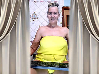 Cheerful Housewife Lukerya Shows Her Bare Feet in Kitchen. Mature Soles and Toes Close Up