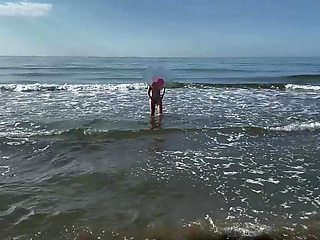 A hotwife and her cuckold on the beach