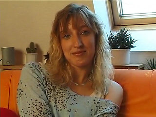 Lovely blonde with pierced tits rubs her pussy at the casting