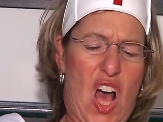 Mature Nurse Spreads Wide for Intense Toy Play While Sucking