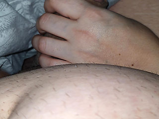 Step mom surprised step son by pulling out his dick under blanket and handjob his cock