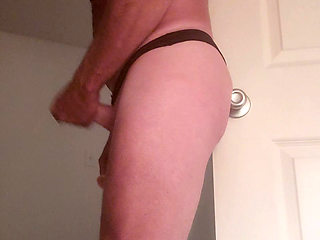 Anal play in my black satin thong.
