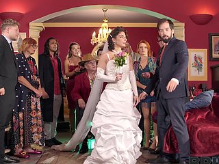 A hot bride is having fun with her new husband