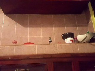 Chubby mom in the kitchen showing thong 2